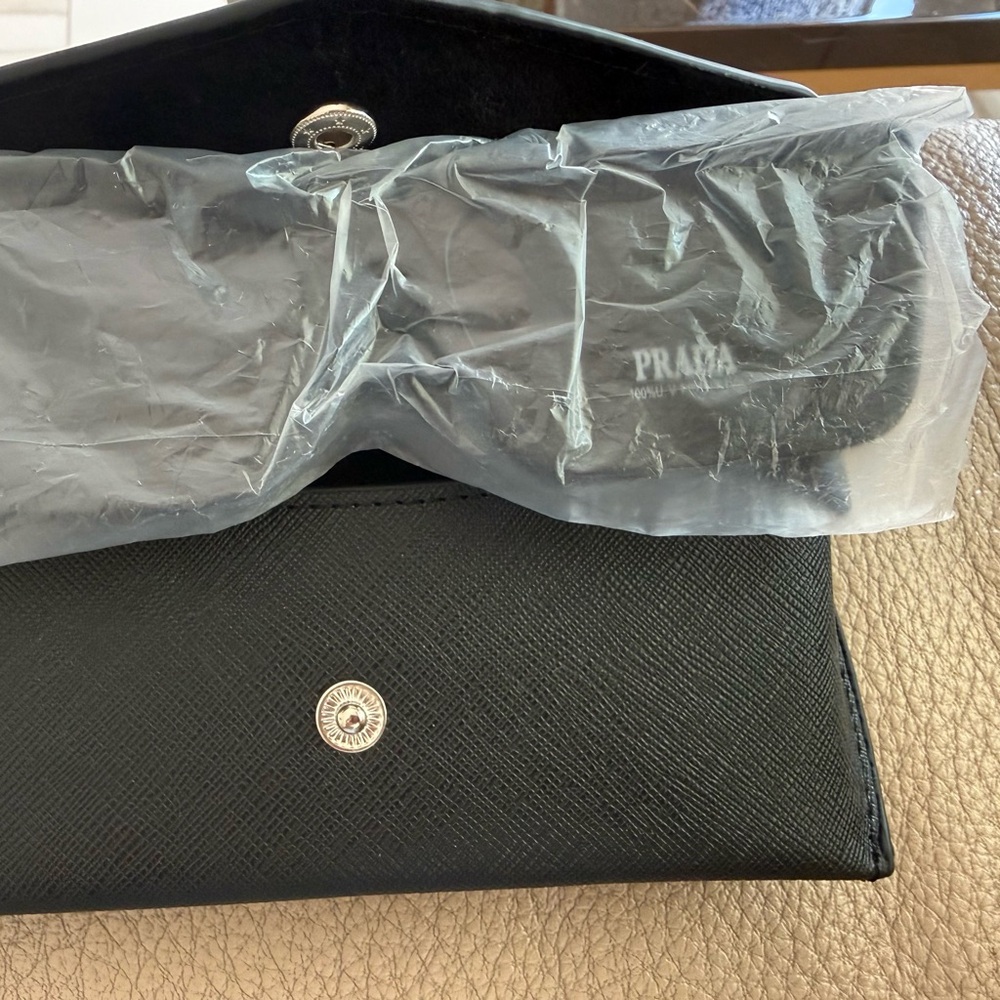Prada Black Women's Cat-Eye Sunglasses with Silver Logo Accent - Picture 4 of 9